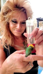 Michelle Lovely with hummingbirds
